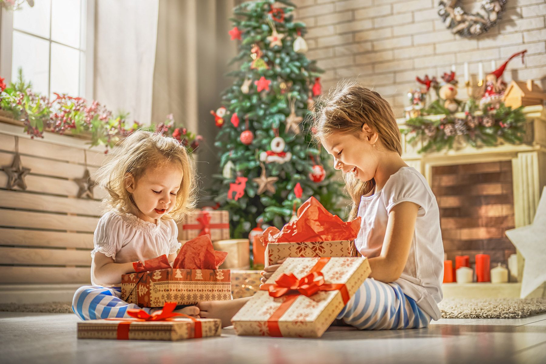 kids unwraping presents