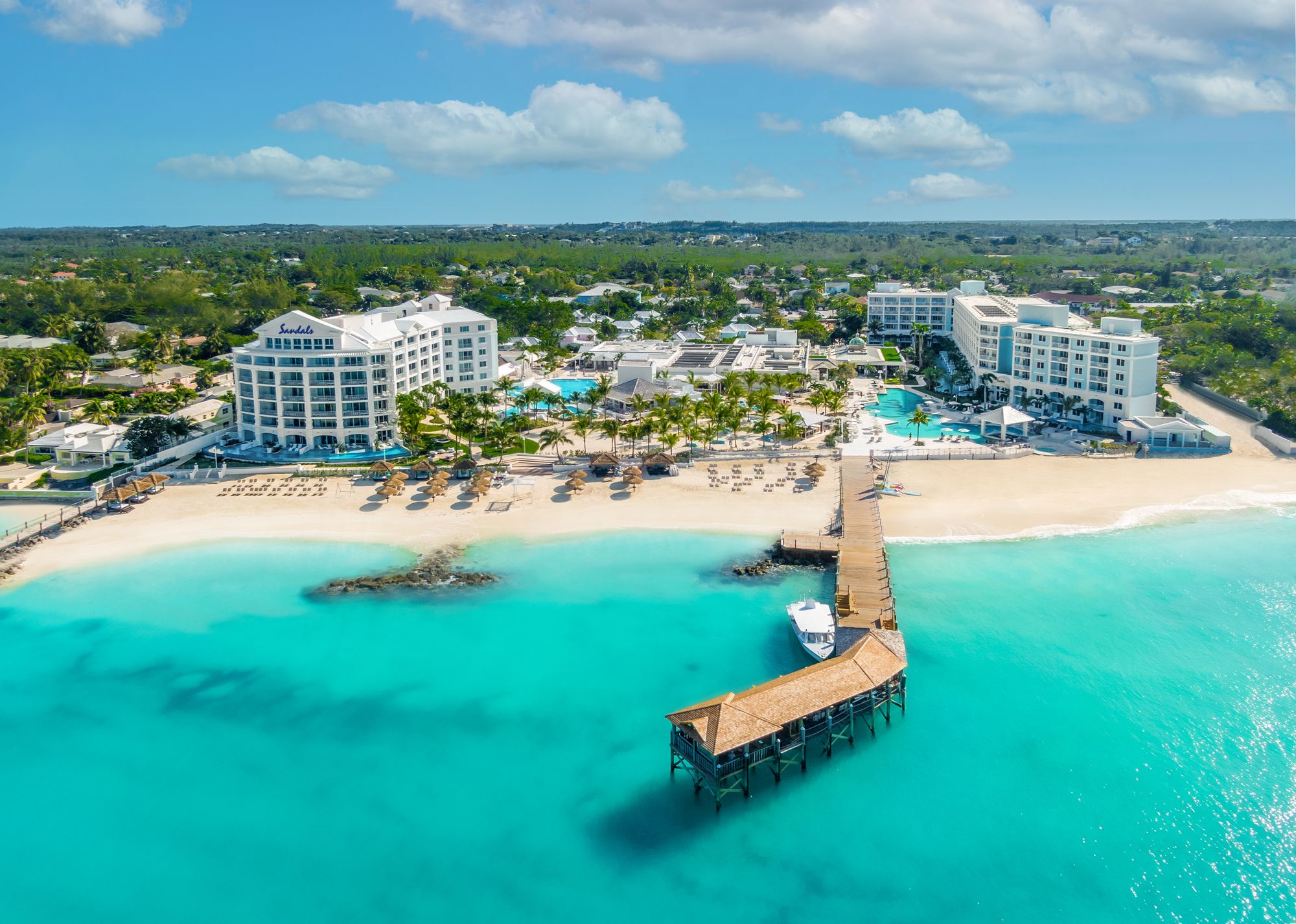 Sandals Royal Bahamian Aerial Reopening Logo