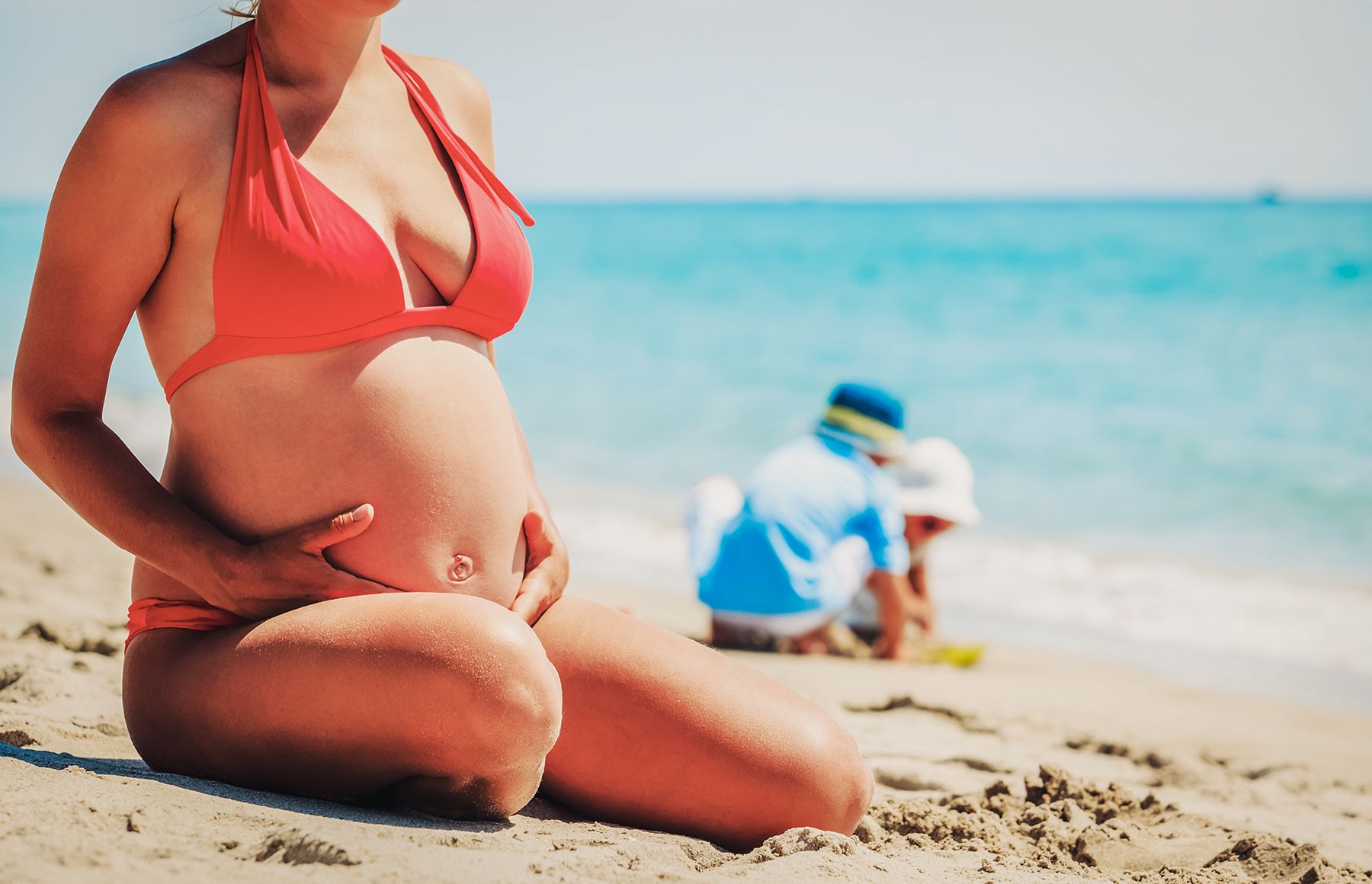 Mother Pregnant Kids Playing Beach