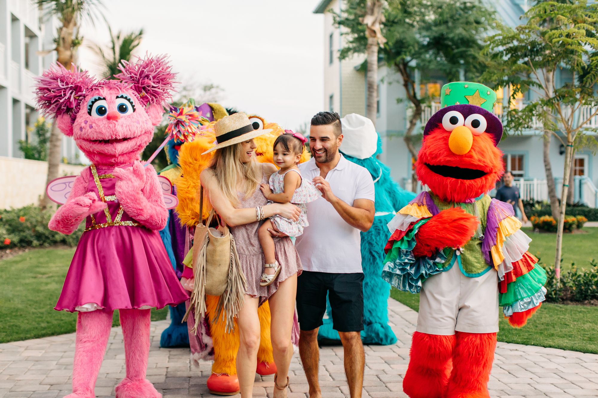 Family with sesame street characters