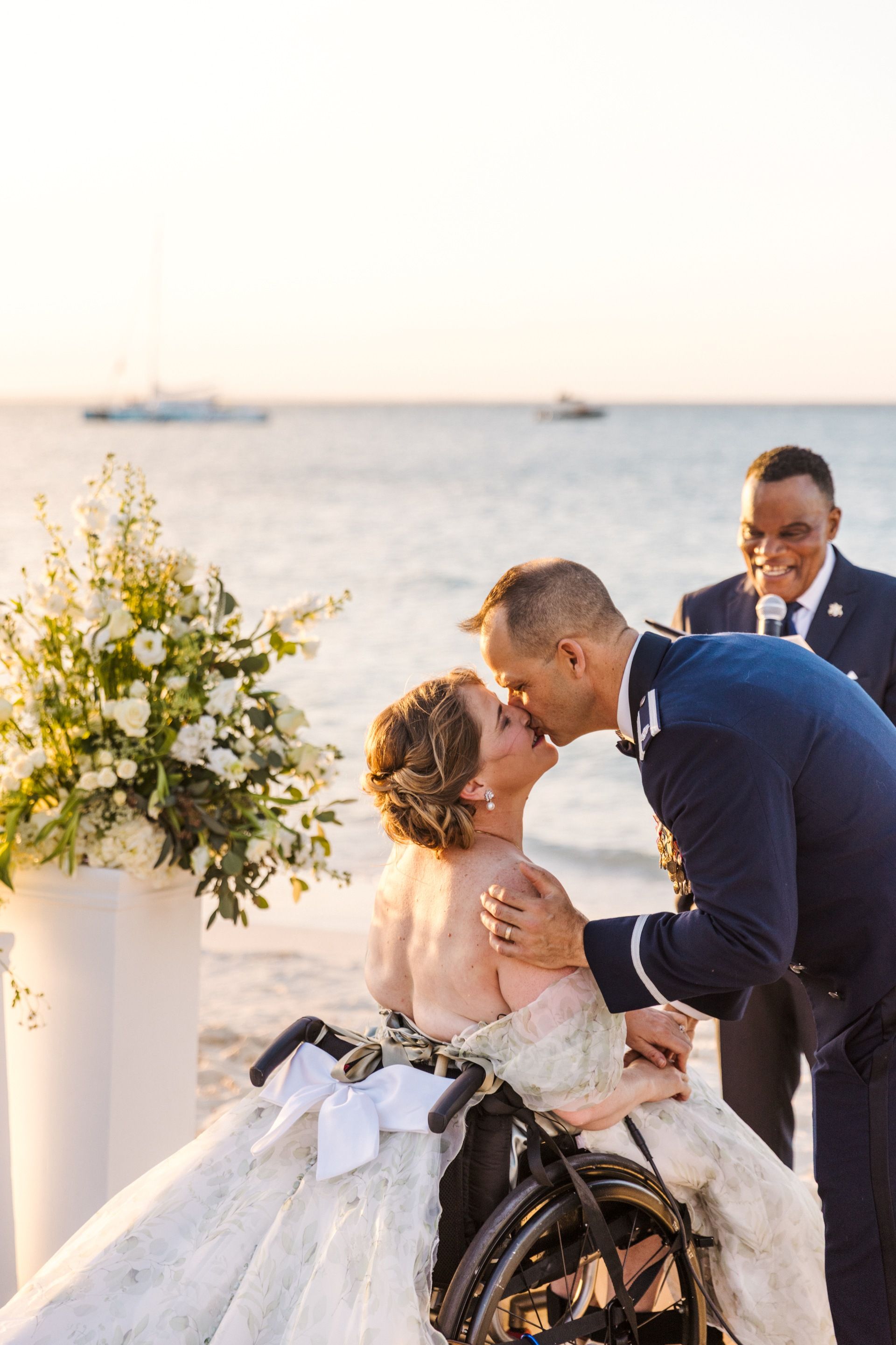 kristy-and-ryan-share-a-kiss-beach-vow-renewal
