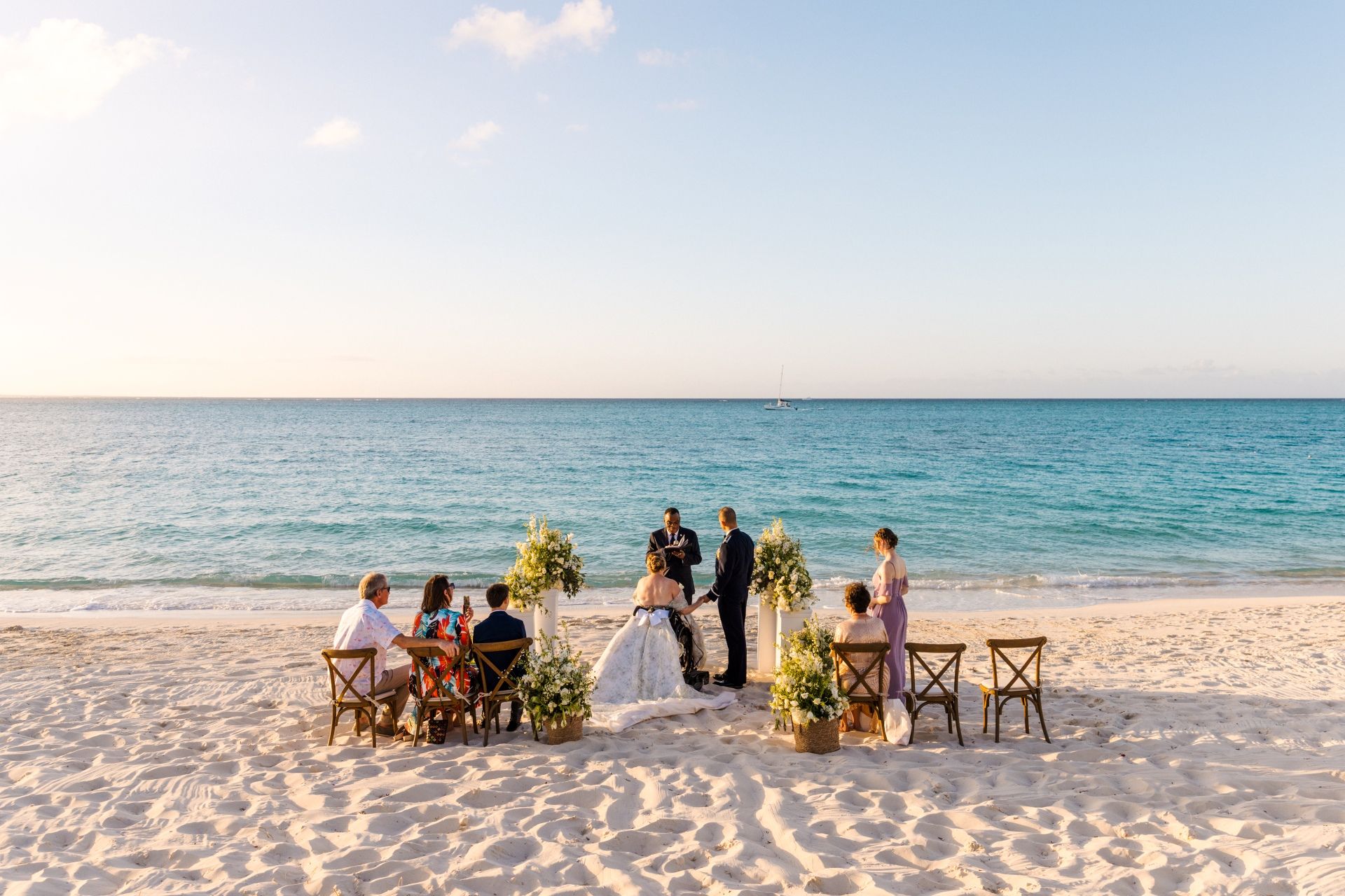 kristy-and-ryans-beach-vow-renewal-ceremony-sunset-with-family